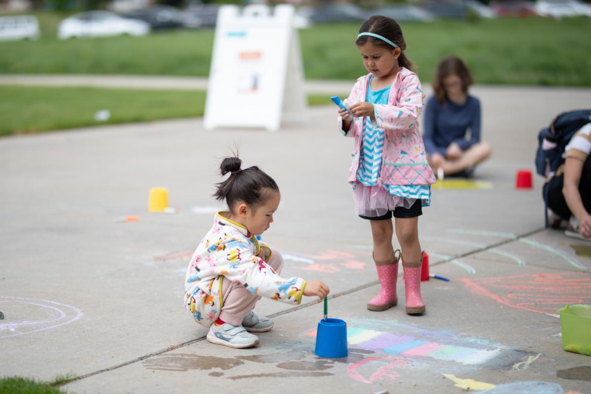 Kids Summer Kickoff Party - Kids playing with chalk